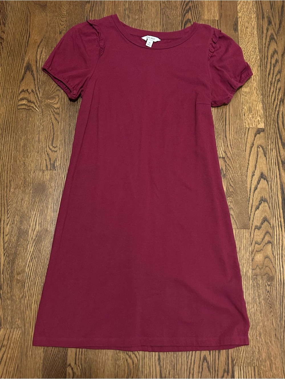 Nine West plum colored short-sleeve shift dress with gathered puff sleeves.
